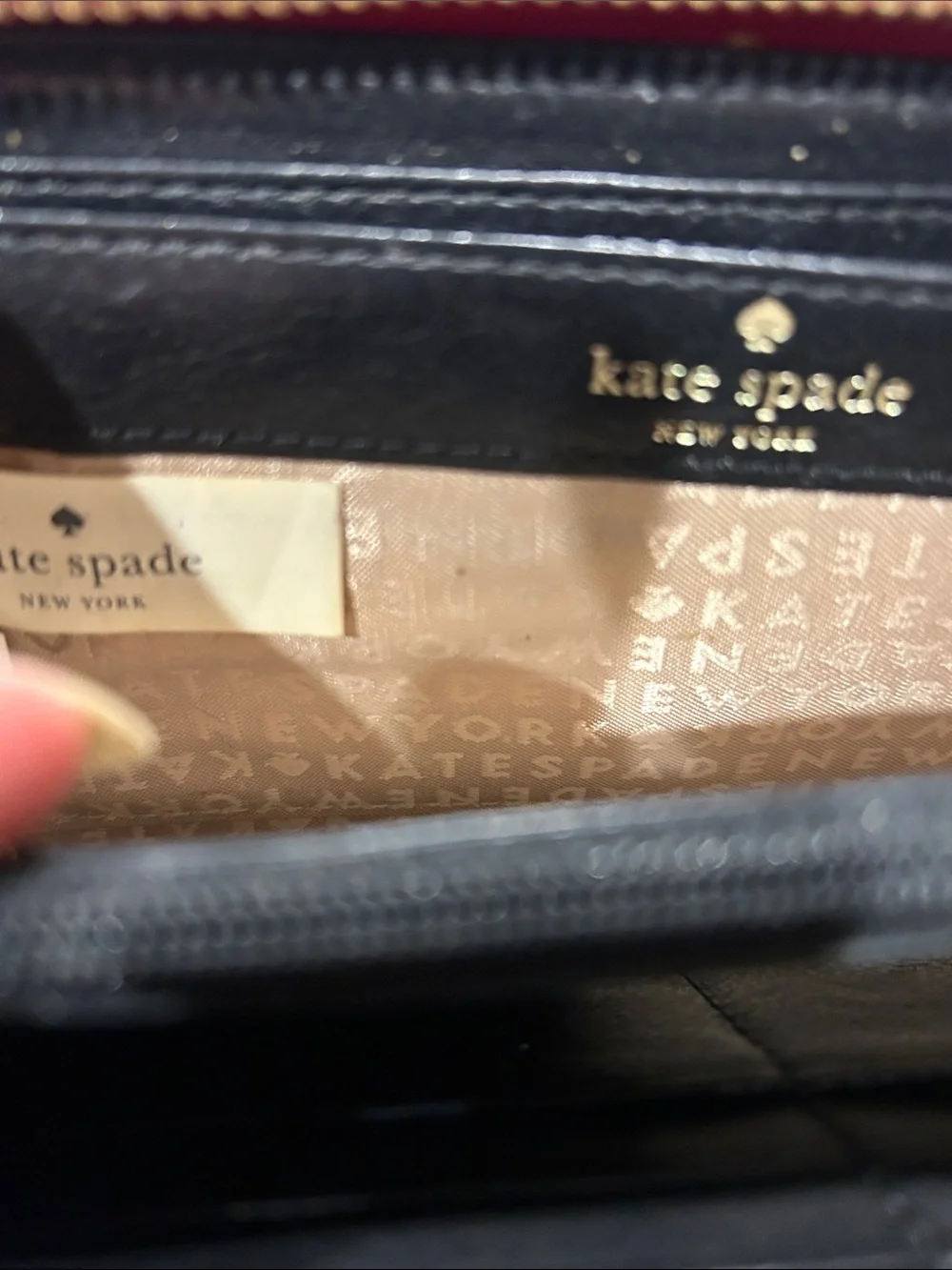 Kate Spade glossy red patent zip wallet with gold plaque